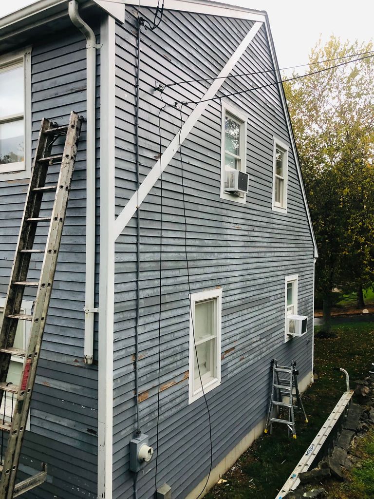 Blue lap siding with white trim, Tiverton, RI