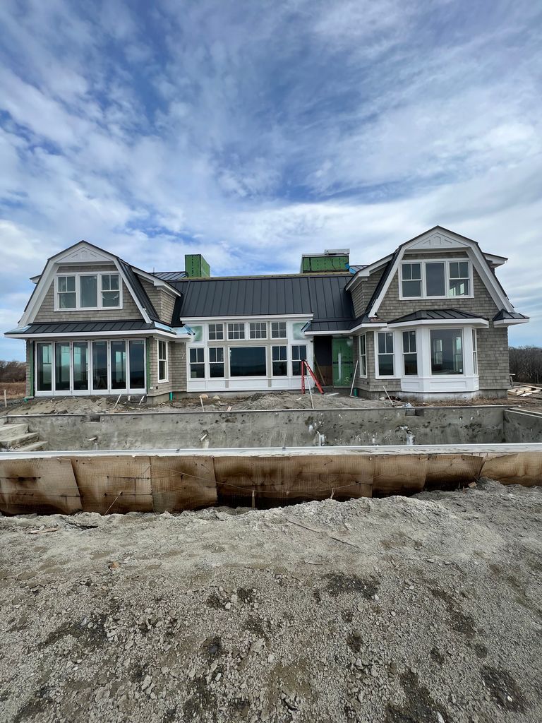 Cedar shingle siding on a new home in Little Compton, RI